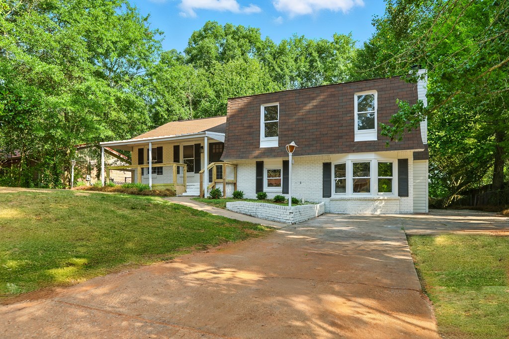 4627 Wimbish Court Columbus, GA 31909 - Photo 25 of 33 a front view of a house with a yard