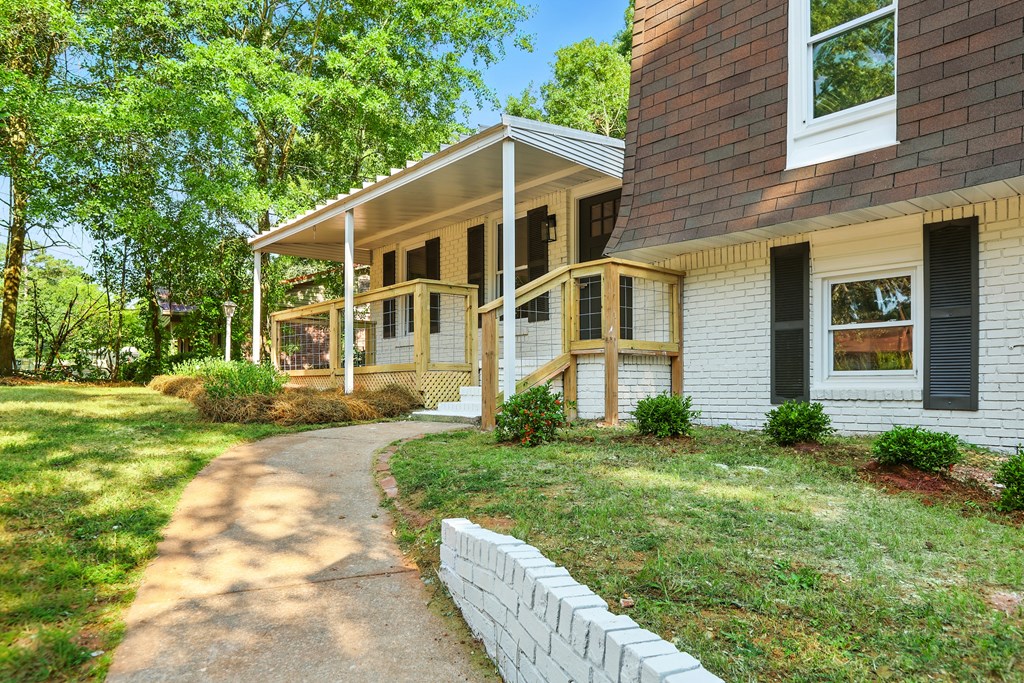4627 Wimbish Court Columbus, GA 31909 - Photo 26 of 33 a front view of a house with garden
