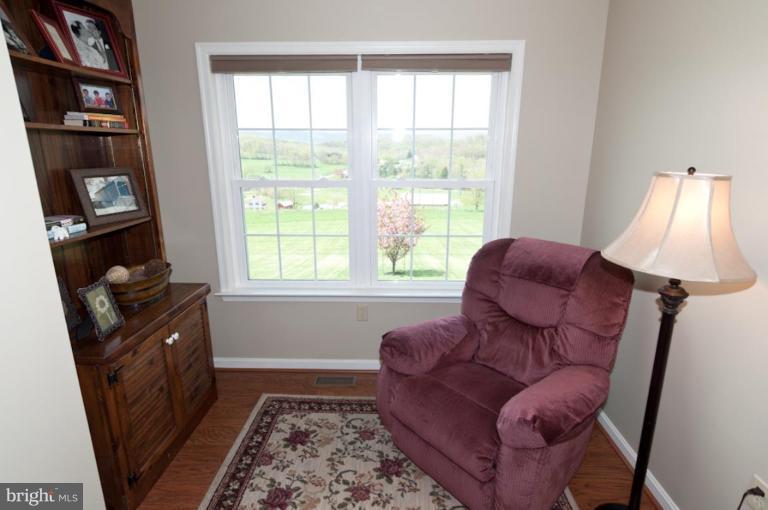 4265 Middlepoint Road Myersville, MD 21773 - Photo 24 of 25 a living room with furniture and a window