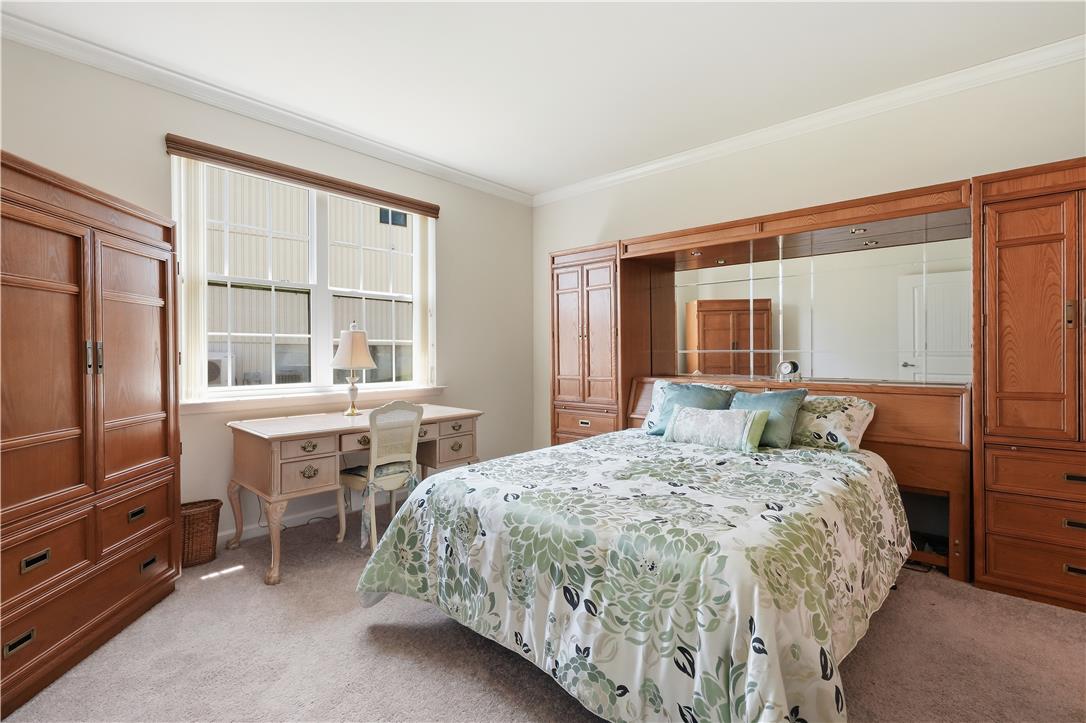 4120 Eveningstar Road Emmaus, PA 18049 - Photo 37 of 62 A comfortable bedroom with carpeted floors and a spacious window for natural illumination.