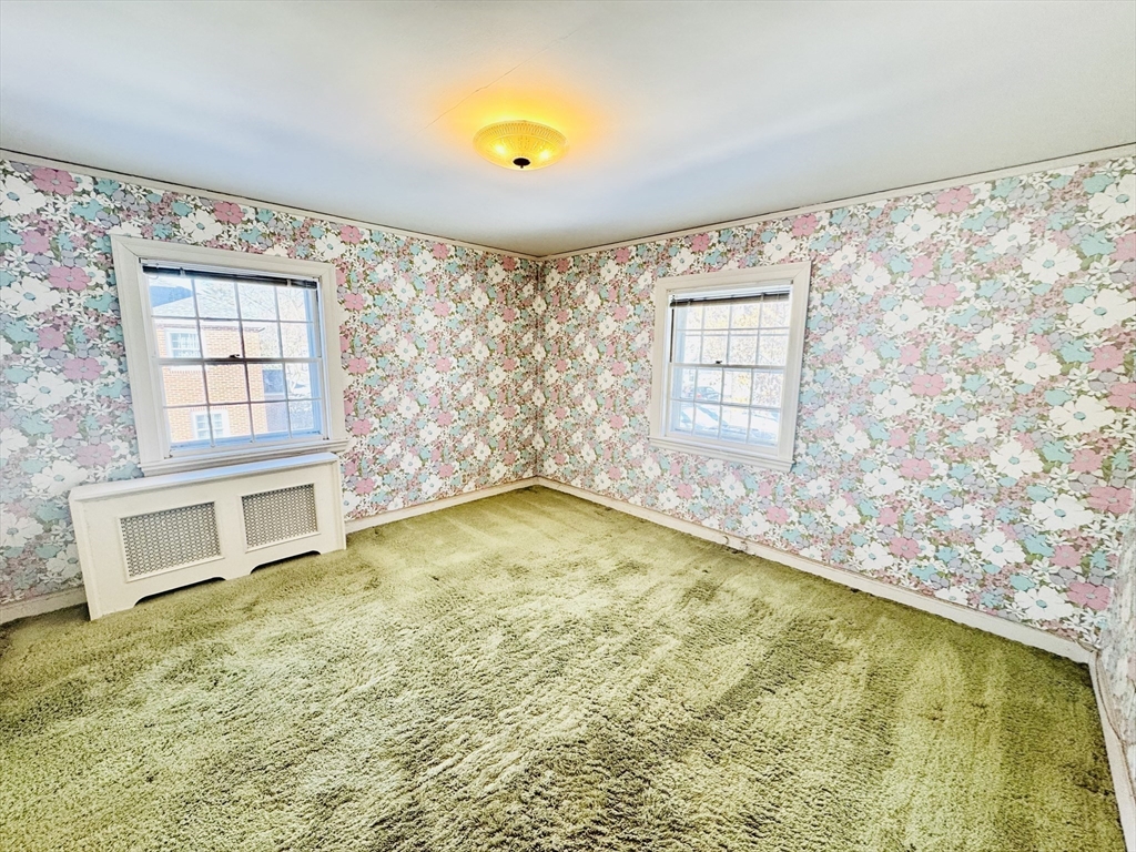 45 Beverly Road Brookline, MA 02467 - Photo 19 of 42 a view of an empty room with a window