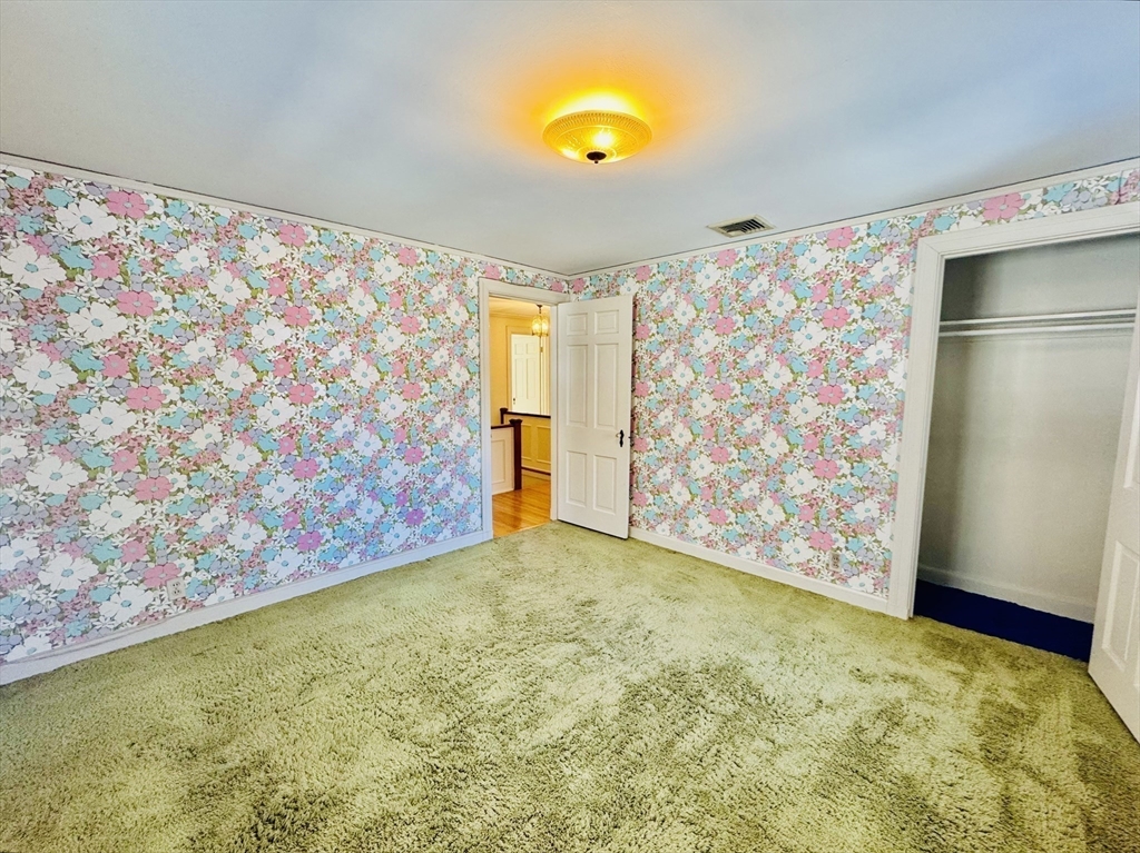 45 Beverly Road Brookline, MA 02467 - Photo 20 of 42 a view of room with window and ceiling fan