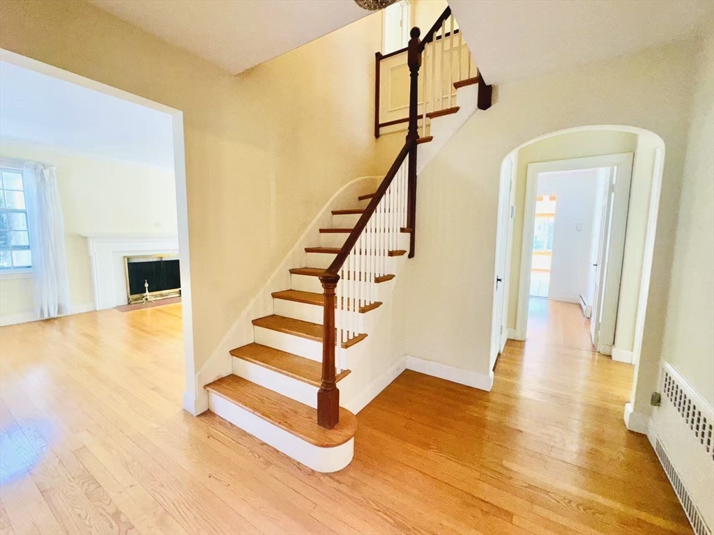 45 Beverly Road Brookline, MA 02467 - Photo 2 of 42 a view of entryway and hall with wooden floor
