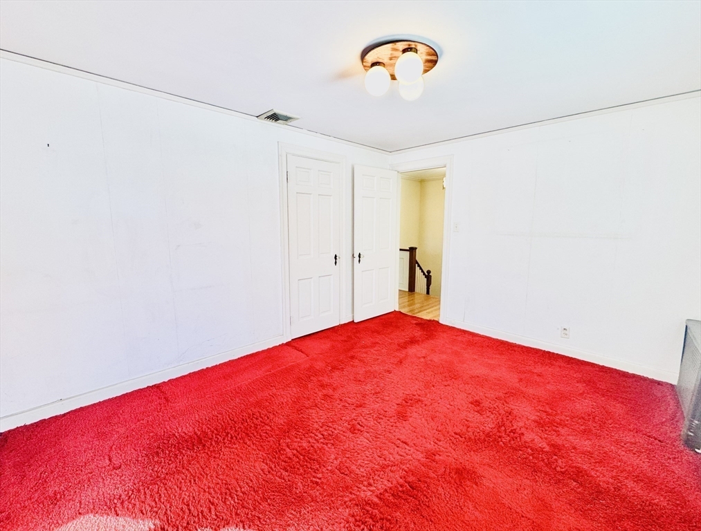 45 Beverly Road Brookline, MA 02467 - Photo 24 of 42 a view of empty room with a fan