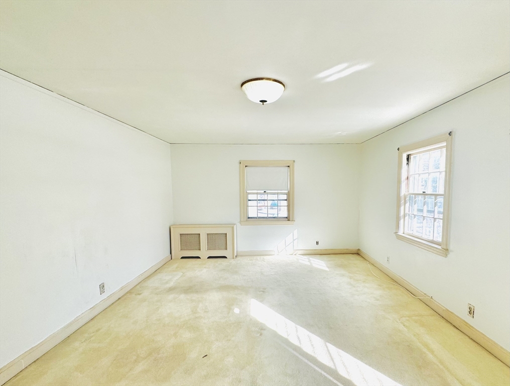 45 Beverly Road Brookline, MA 02467 - Photo 26 of 42 a view of empty room with windows