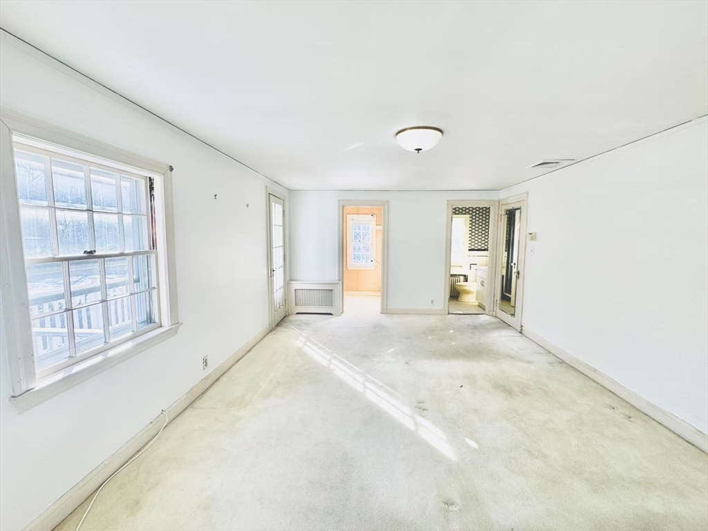 45 Beverly Road Brookline, MA 02467 - Photo 27 of 42 a view of an empty room with a window