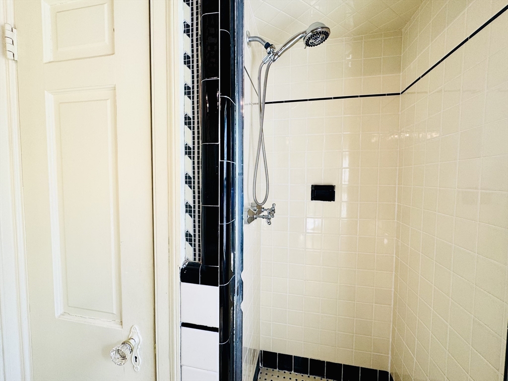 45 Beverly Road Brookline, MA 02467 - Photo 30 of 42 a bathroom with a shower
