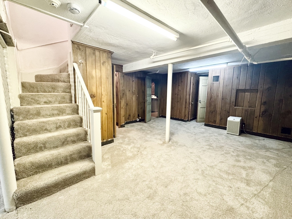 45 Beverly Road Brookline, MA 02467 - Photo 32 of 42 a view of an empty room with stairs