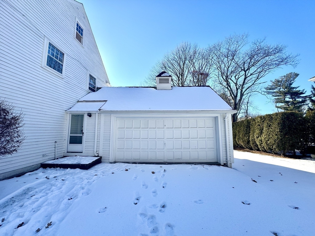 45 Beverly Road Brookline, MA 02467 - Photo 33 of 42 a front view of a house with a yard