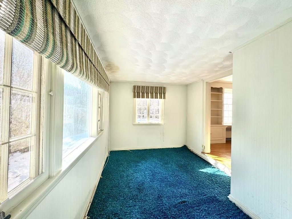 45 Beverly Road Brookline, MA 02467 - Photo 5 of 42 a view of an empty room with a window