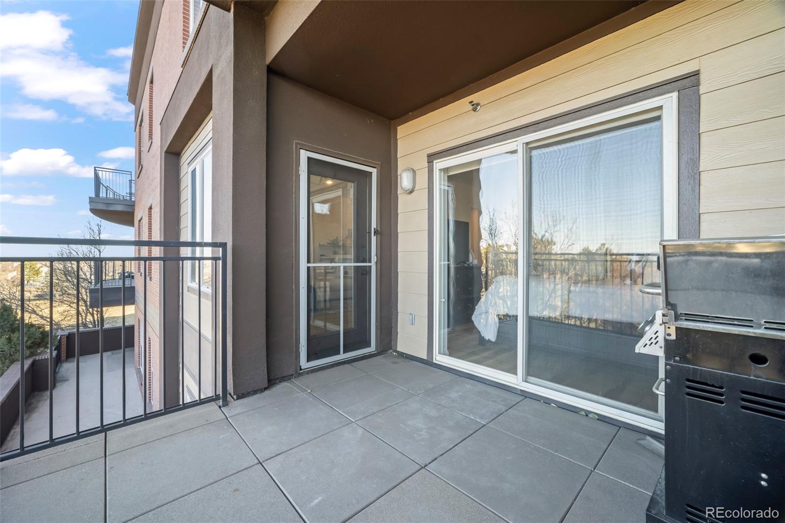 15475 Andrews Drive, Unit 307 Denver, CO 80239 - Photo 30 of 36 a view of a balcony