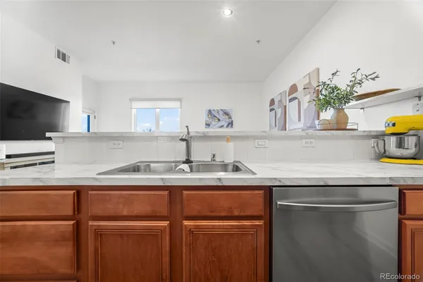 $280,000 | 15475 Andrews Drive, Unit 307, Denver, CO 80239