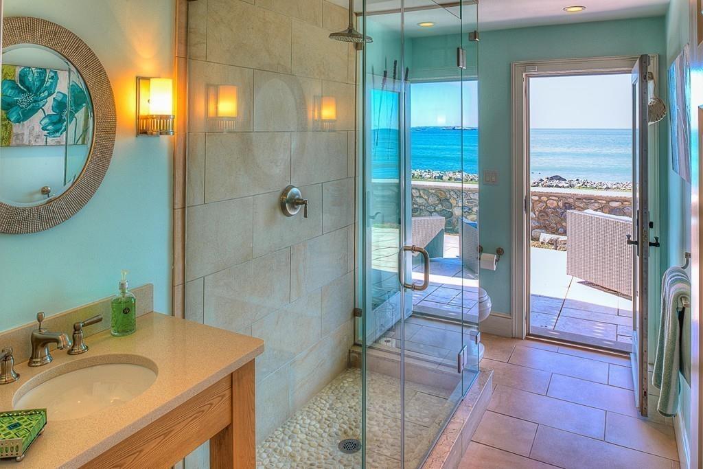 201 Ocean Avenue Marblehead, MA 01945 - Photo 12 of 21 a bathroom with a sink a toilet and shower