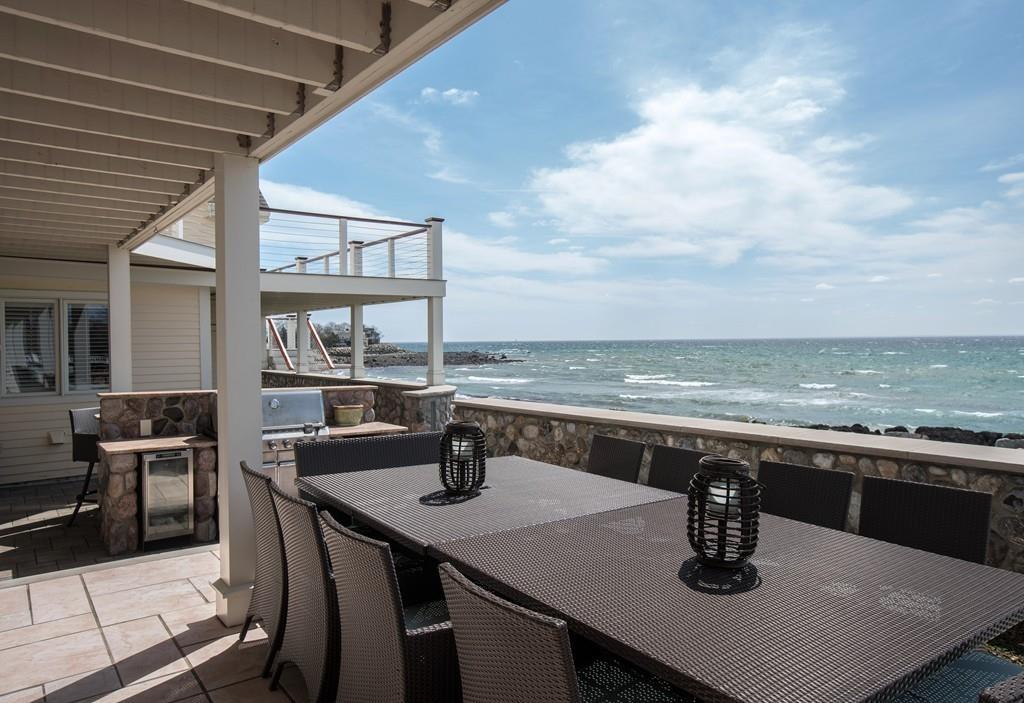 201 Ocean Avenue Marblehead, MA 01945 - Photo 4 of 21 a view of a table and chairs in the patio