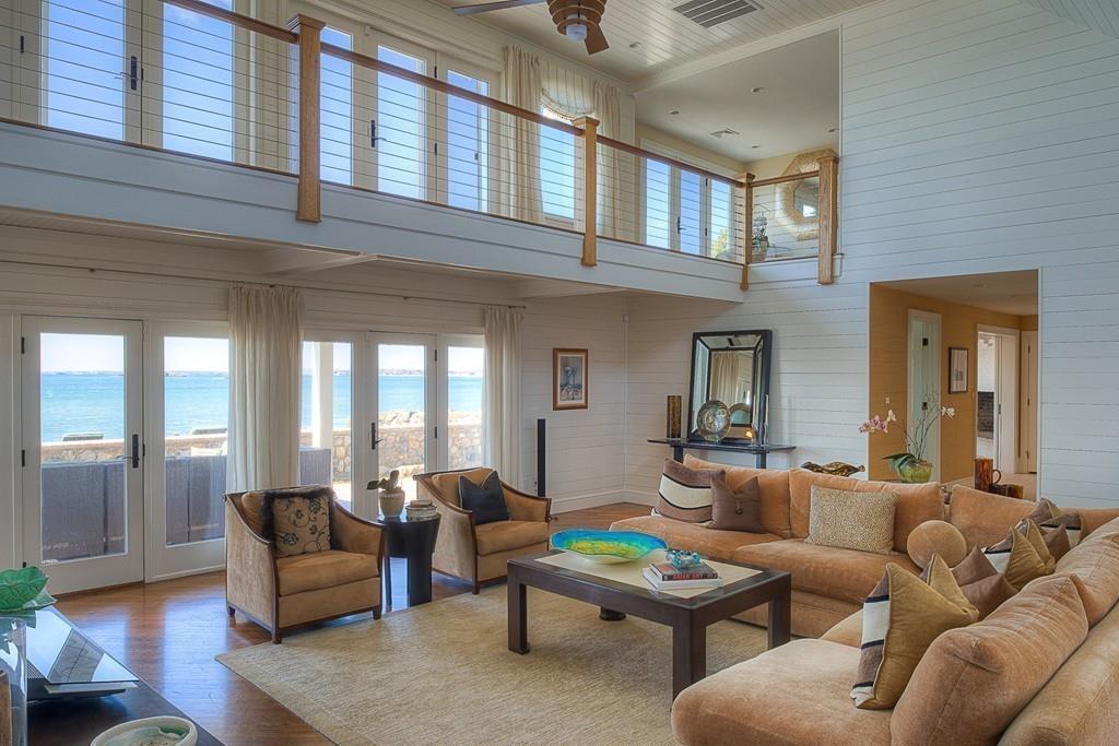 201 Ocean Avenue Marblehead, MA 01945 - Photo 7 of 21 a living room with furniture wooden floor and a table