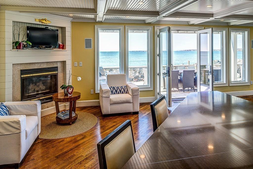 201 Ocean Avenue Marblehead, MA 01945 - Photo 8 of 21 a living room with furniture fireplace and flat screen tv