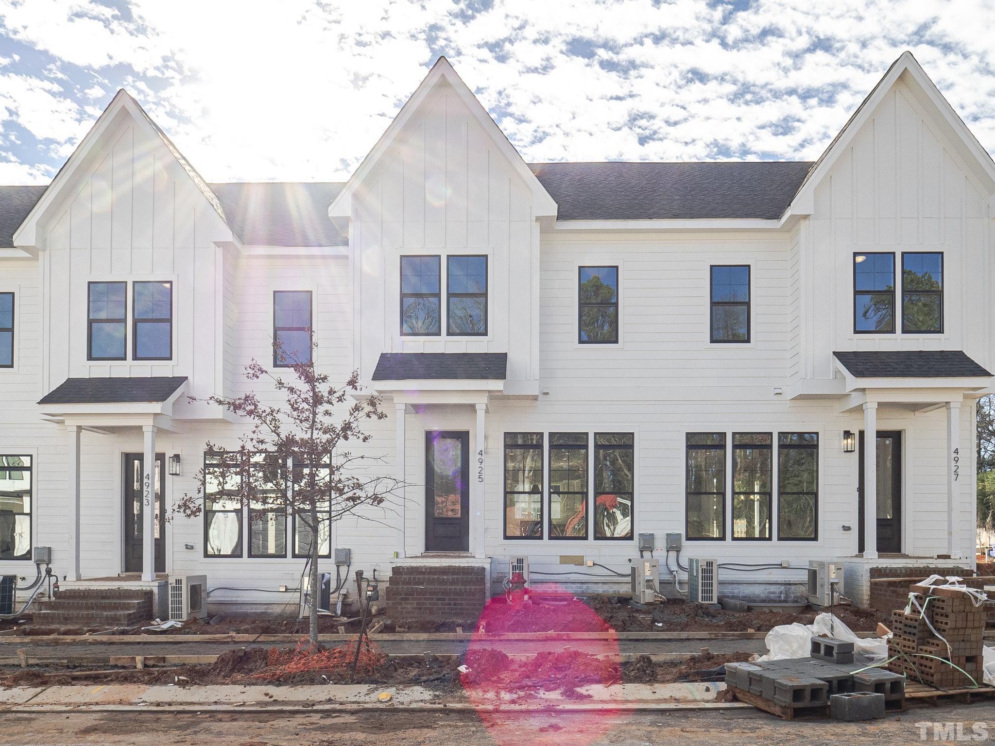 4922 Trek Lane Raleigh, NC 27606 - Photo 1 of 28 a front view of a house with yard