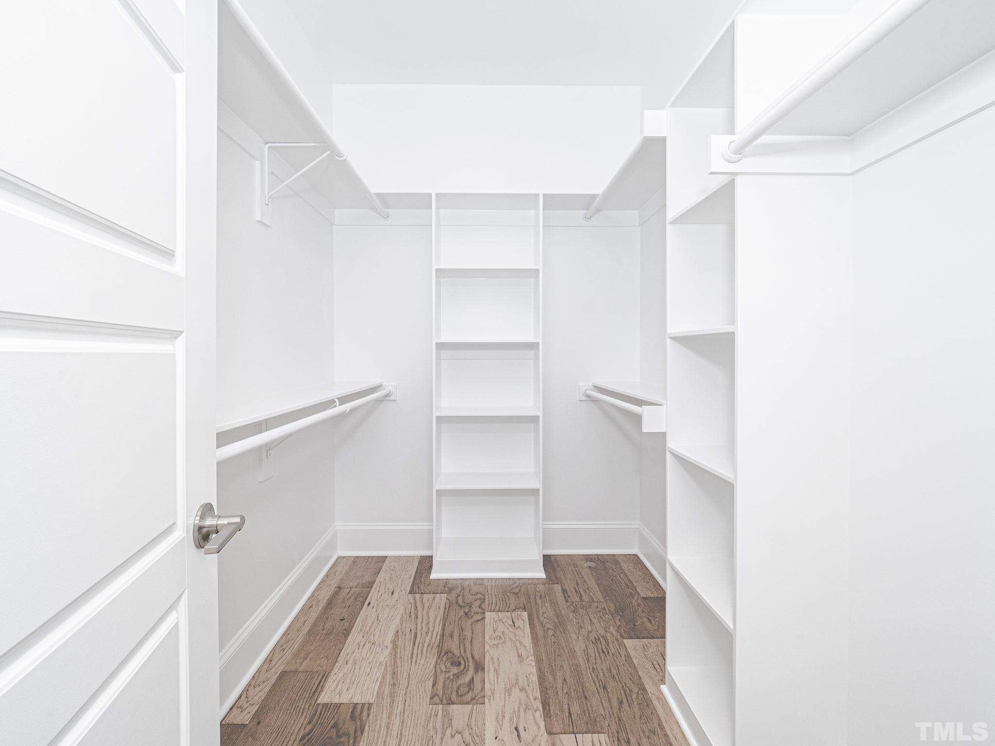 4922 Trek Lane Raleigh, NC 27606 - Photo 21 of 28 a view of a room with a wooden floor