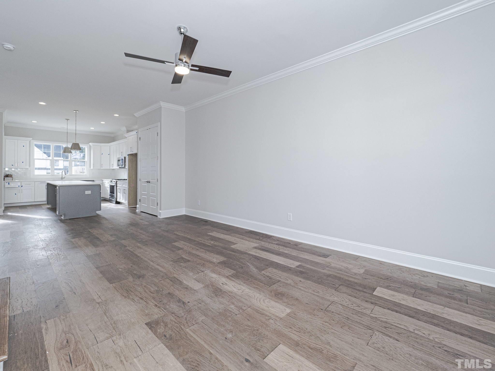 4922 Trek Lane Raleigh, NC 27606 - Photo 6 of 28 a view of an empty room and kitchen view