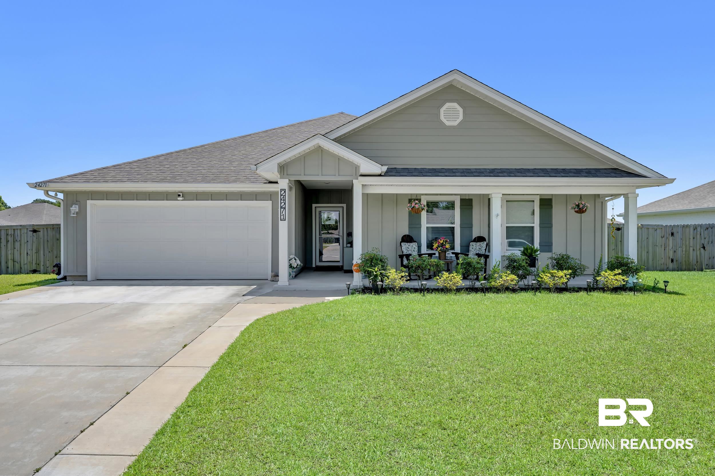 24271 Ringneck Loop Elberta, AL 36530 - Photo 1 of 44 Single-story residence featuring light gray siding and a dark shingle roof