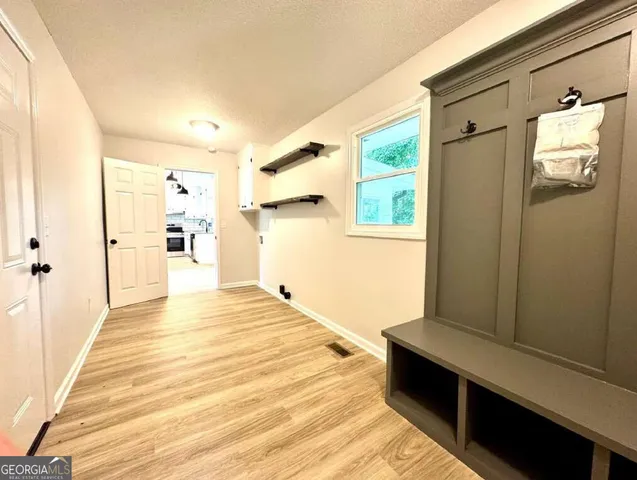 a bathroom with a sink and a shower