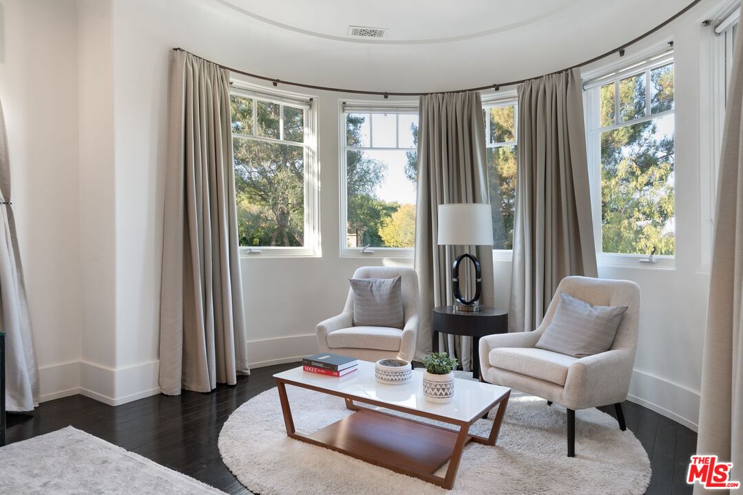 8 Beverly Ridge Terrace Beverly Hills, CA 90210 - Photo 61 of 74 a living room with furniture and a window