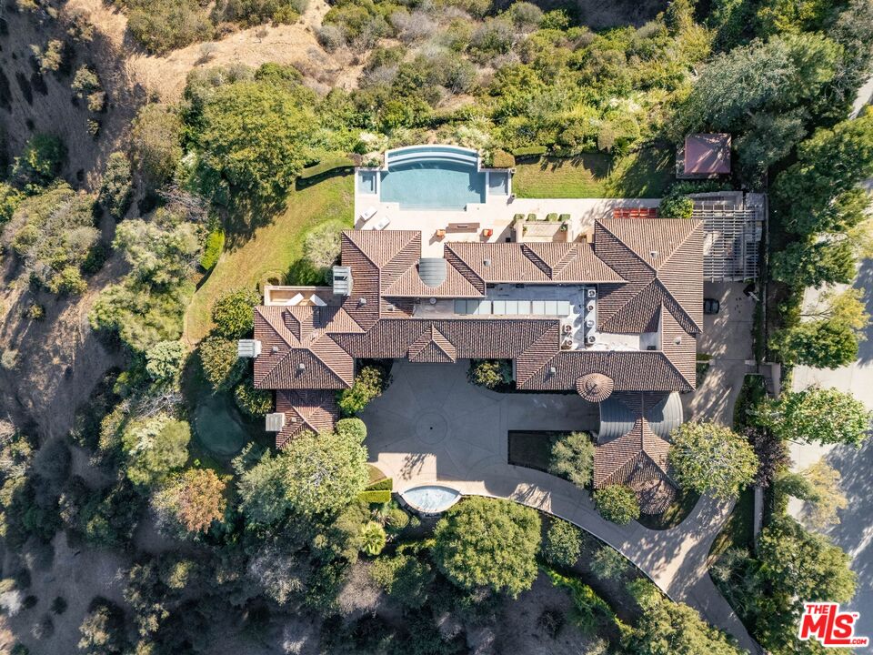 8 Beverly Ridge Terrace Beverly Hills, CA 90210 - Photo 67 of 74 an aerial view of a house with a yard basket ball court and outdoor seating