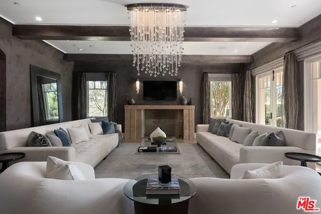 a view of a livingroom with furniture and window