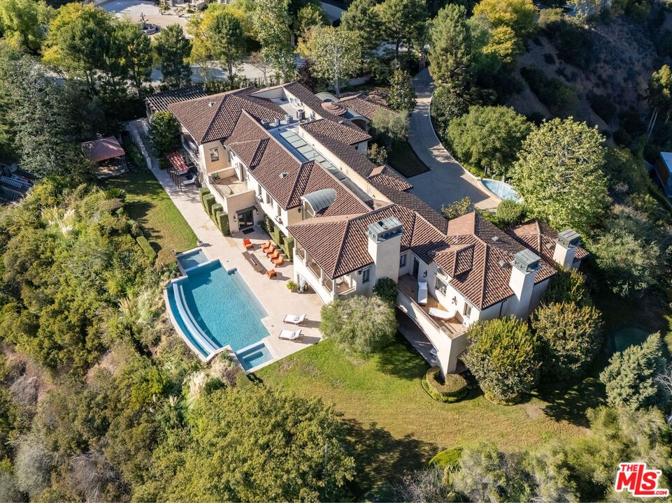 8 Beverly Ridge Terrace Beverly Hills, CA 90210 - Photo 72 of 74 an aerial view of a house with a yard and greenery