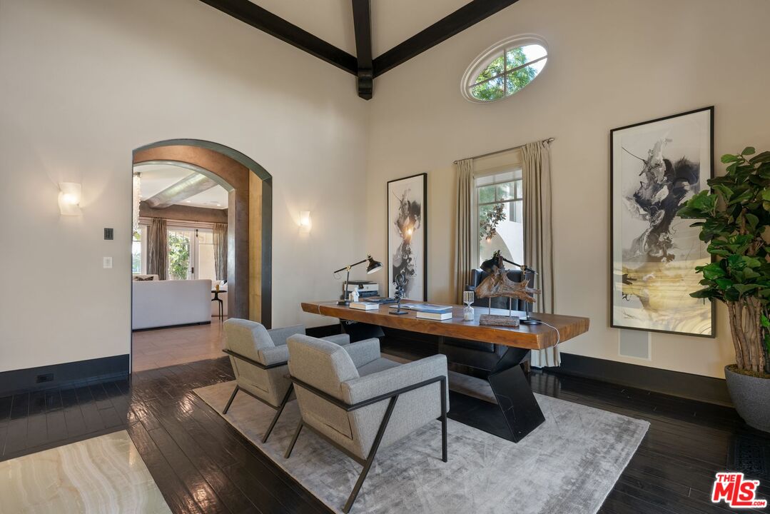 8 Beverly Ridge Terrace Beverly Hills, CA 90210 - Photo 10 of 74 a view of a livingroom with furniture and window