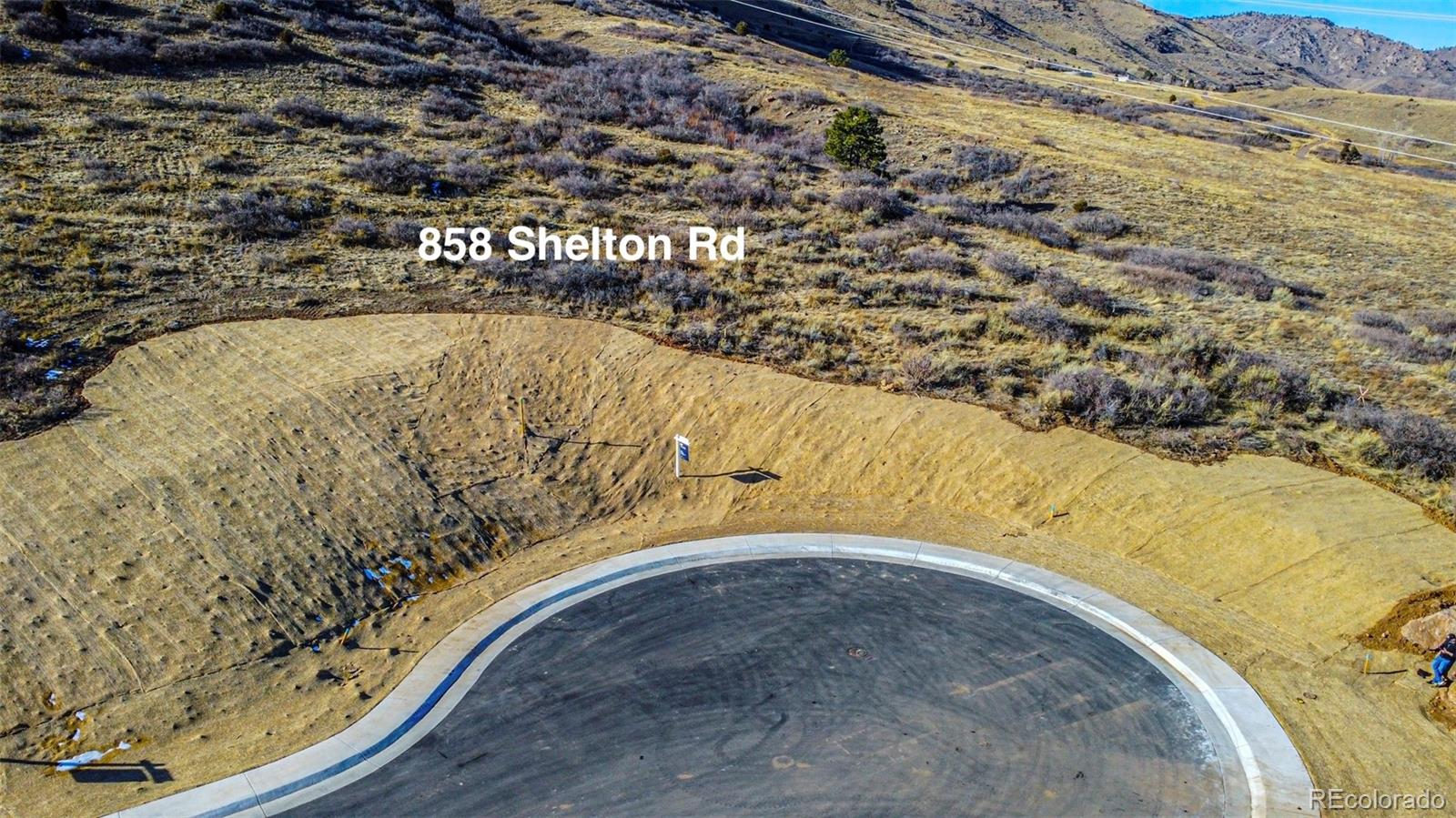858 Shelton Road Golden, CO 80401 - Photo 12 of 18 a view of swimming pool and mountain in the back