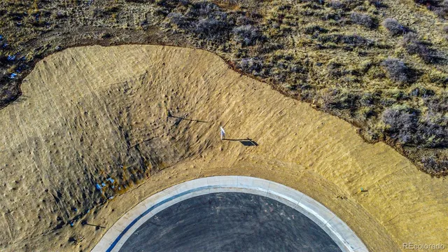 a view of swimming pool with a yard