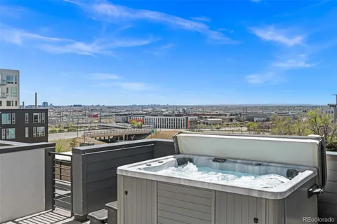 a terrace with a table and chairs