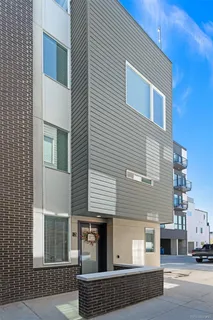 a view of a house with a parking space
