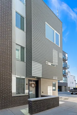 a view of a house with a parking space
