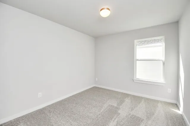 a view of a backyard with barn