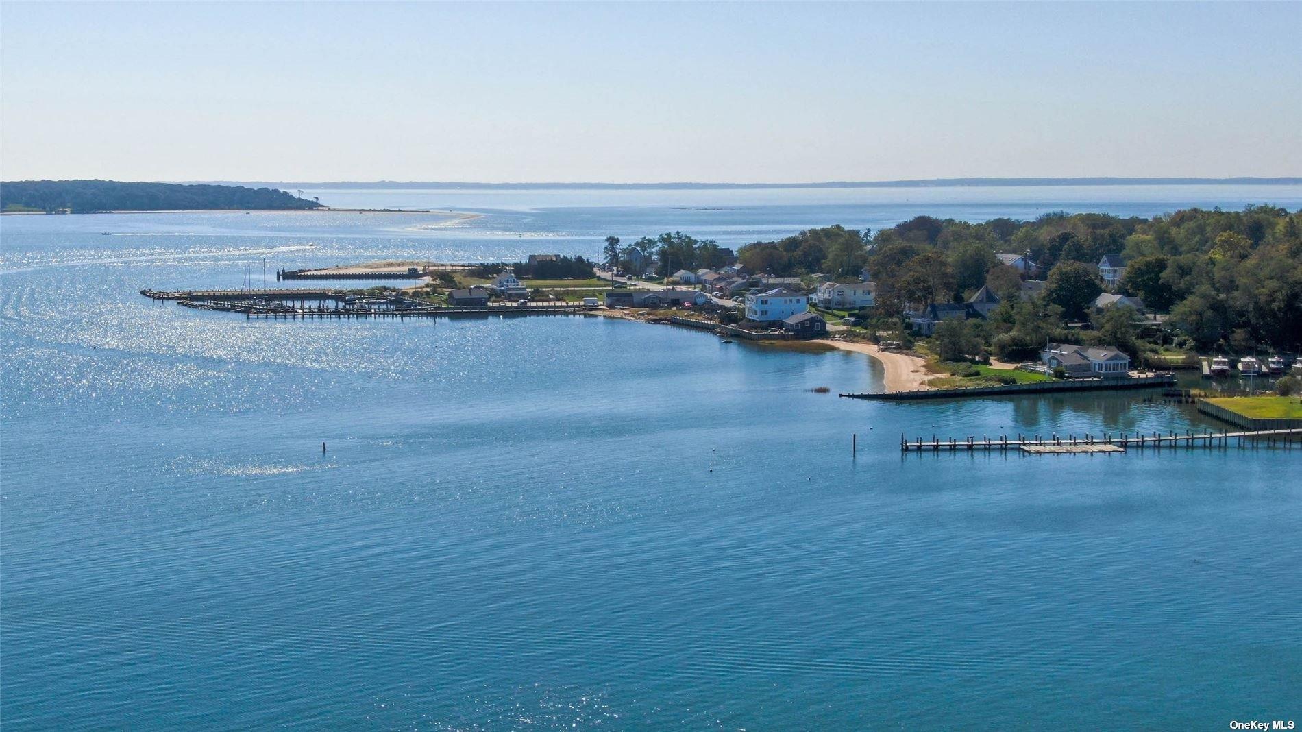 189 Old Harbor Road New Suffolk, NY 11956 - Photo 26 of 26 an aerial view of ocean and trees