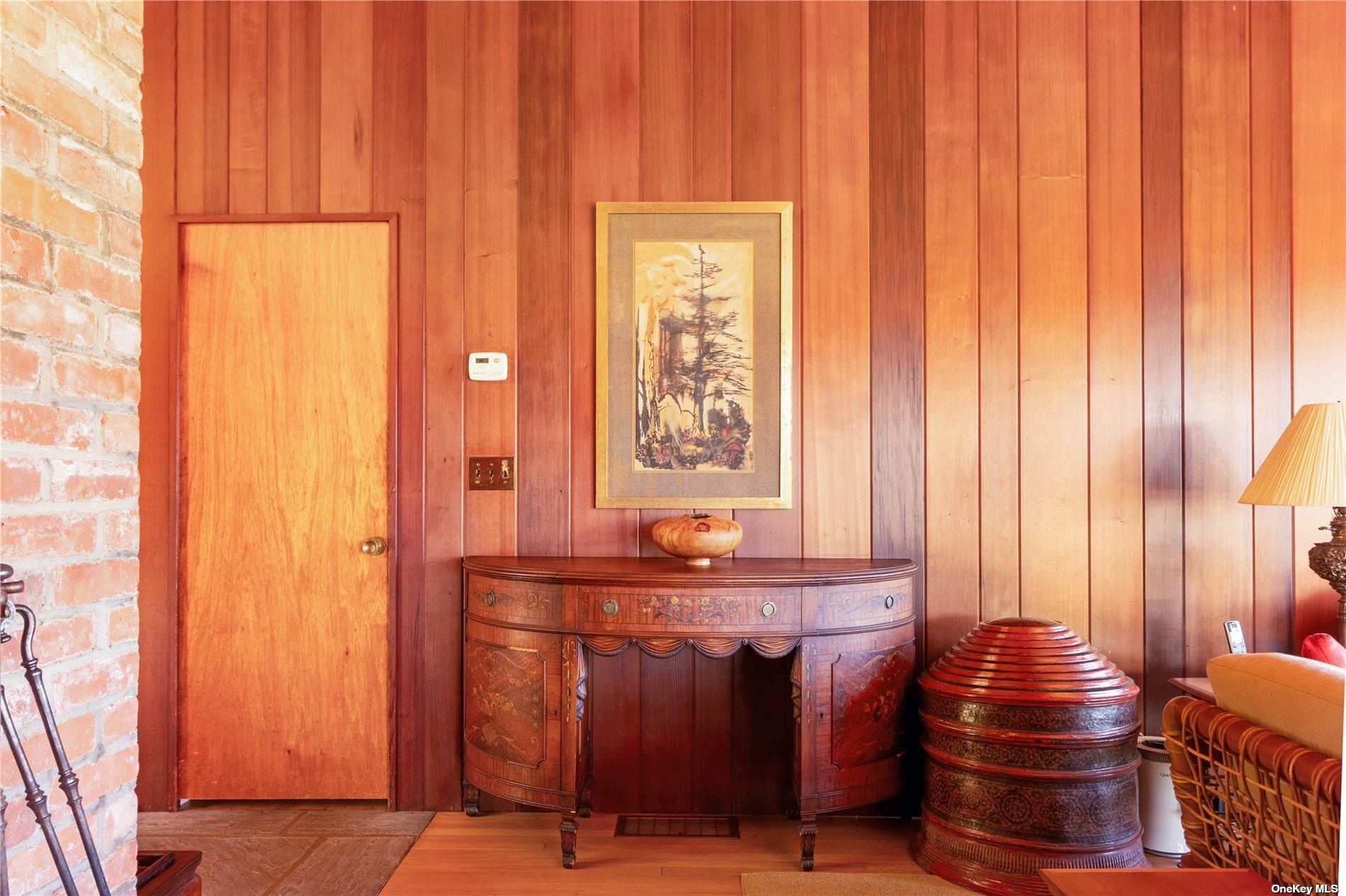 189 Old Harbor Road New Suffolk, NY 11956 - Photo 10 of 26 a room with a table and chairs