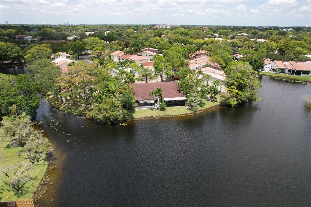 718 Southwest 88th Terrace, Unit 718 Plantation, FL 33324 - Photo 29 of 37 an aerial view of a house with a lake view