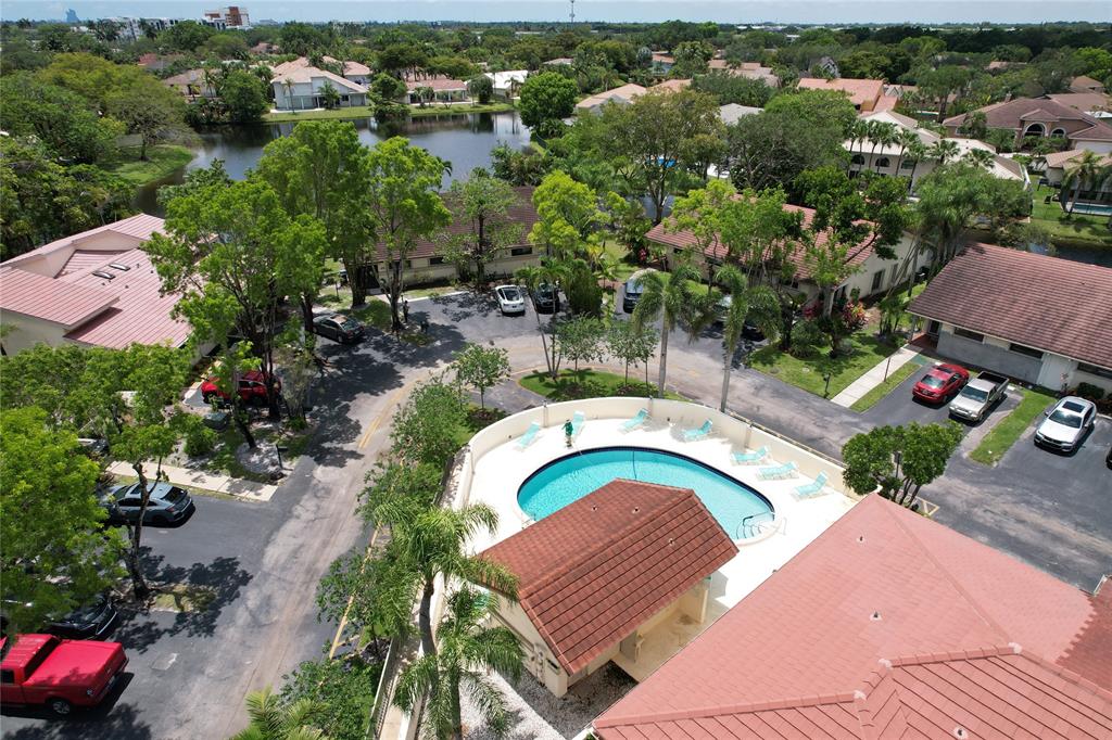 718 Southwest 88th Terrace, Unit 718 Plantation, FL 33324 - Photo 31 of 37 an aerial view of house with yard swimming pool and outdoor seating