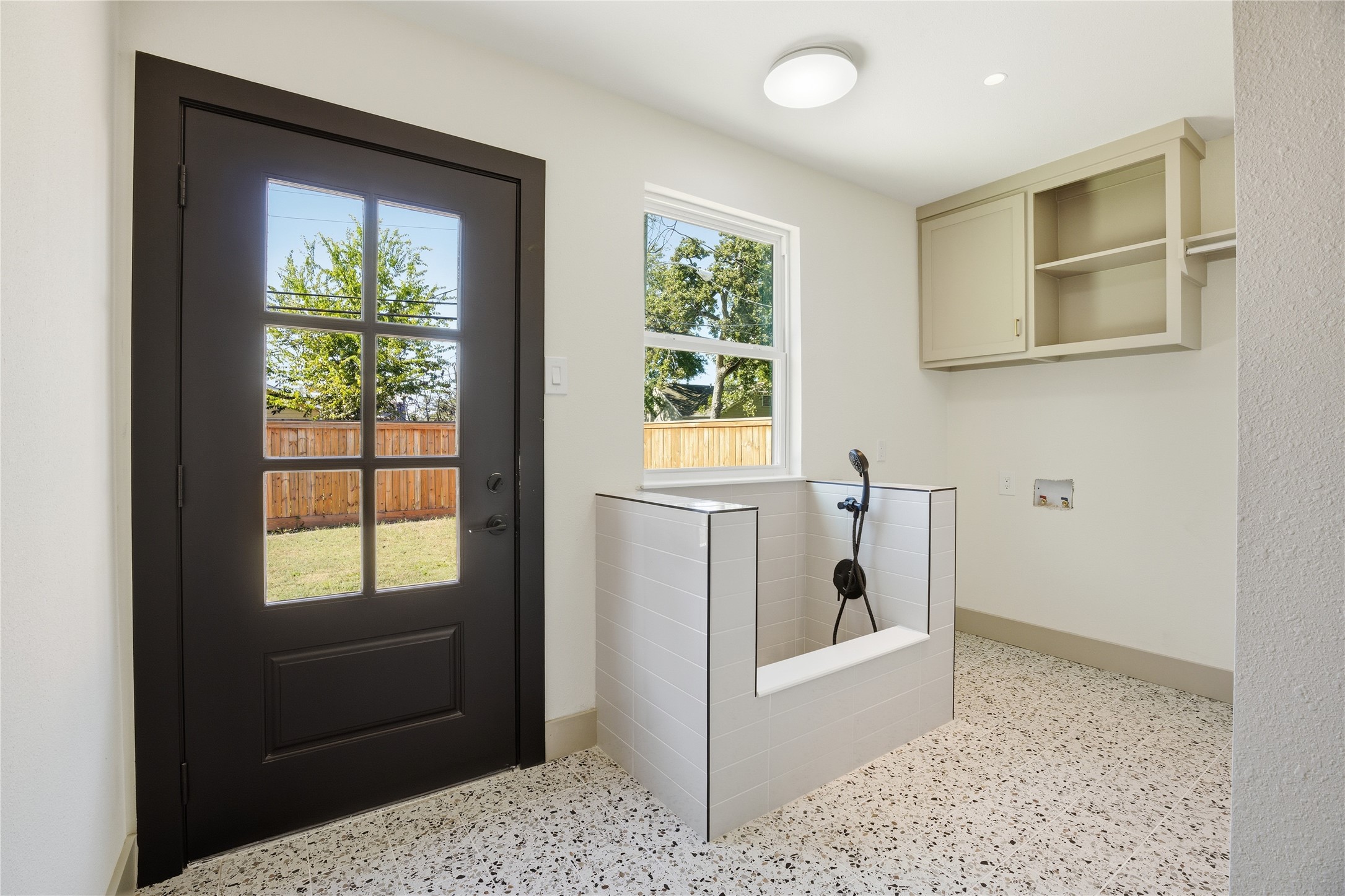 1415 Tabor Street Houston, TX 77009 - Photo 12 of 31 a living room with a couch and a window