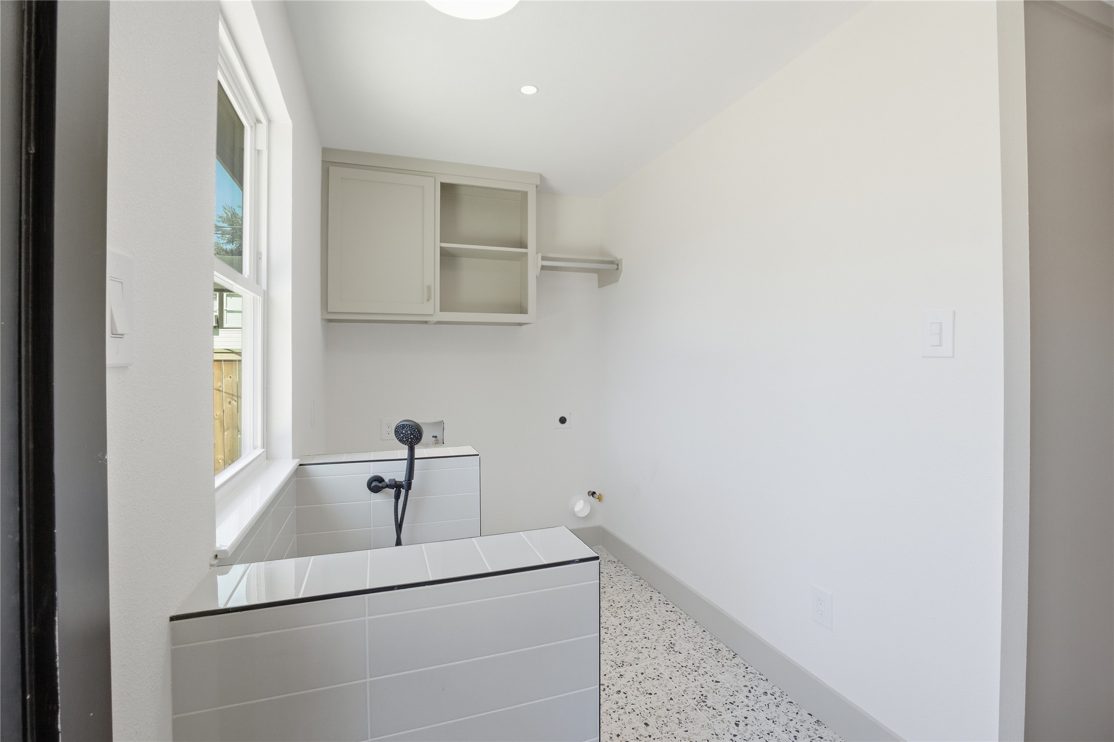 1415 Tabor Street Houston, TX 77009 - Photo 13 of 31 a bathroom with a sink and a mirror