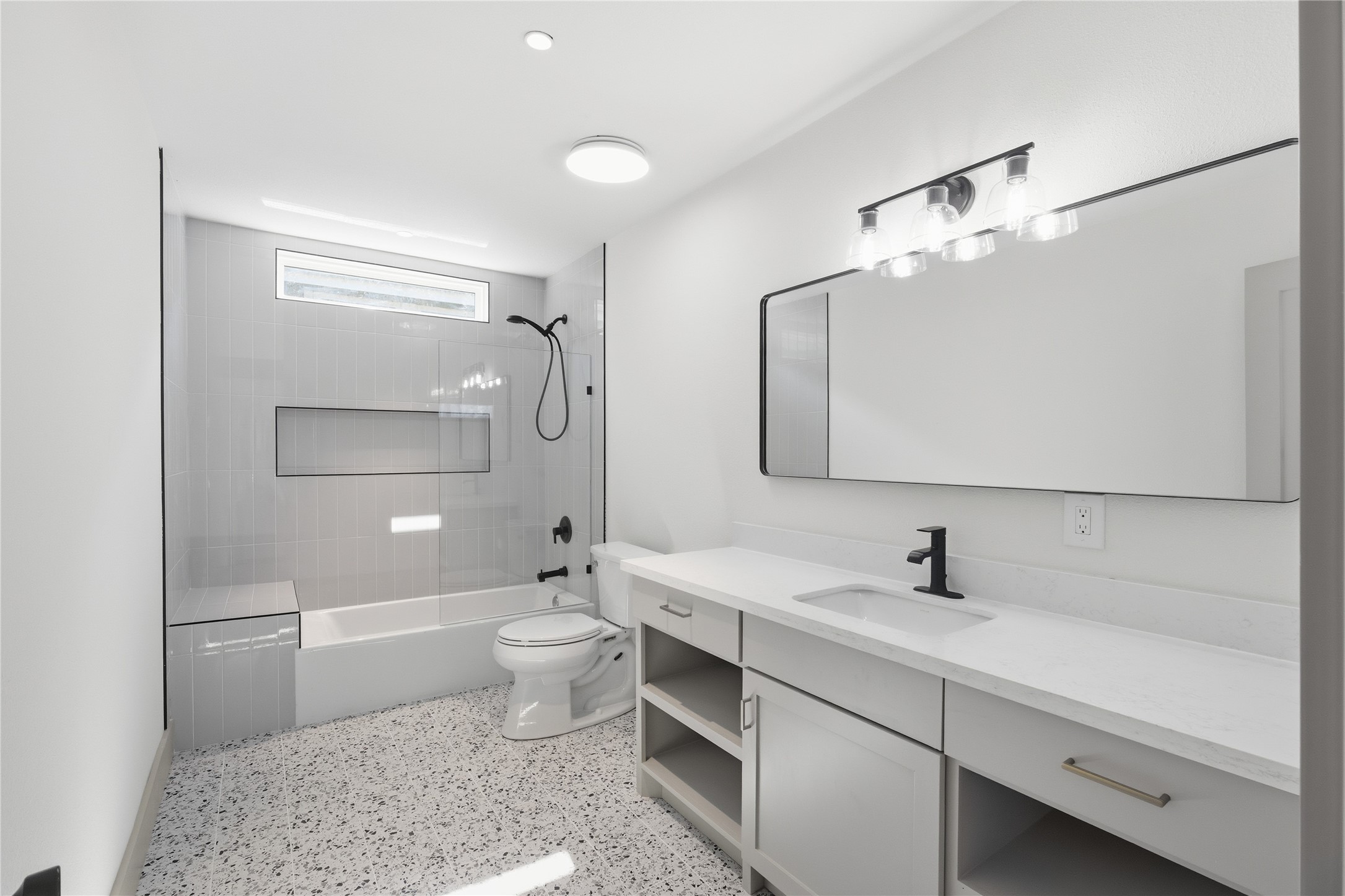 1415 Tabor Street Houston, TX 77009 - Photo 14 of 31 a bathroom with a sink a toilet and shower