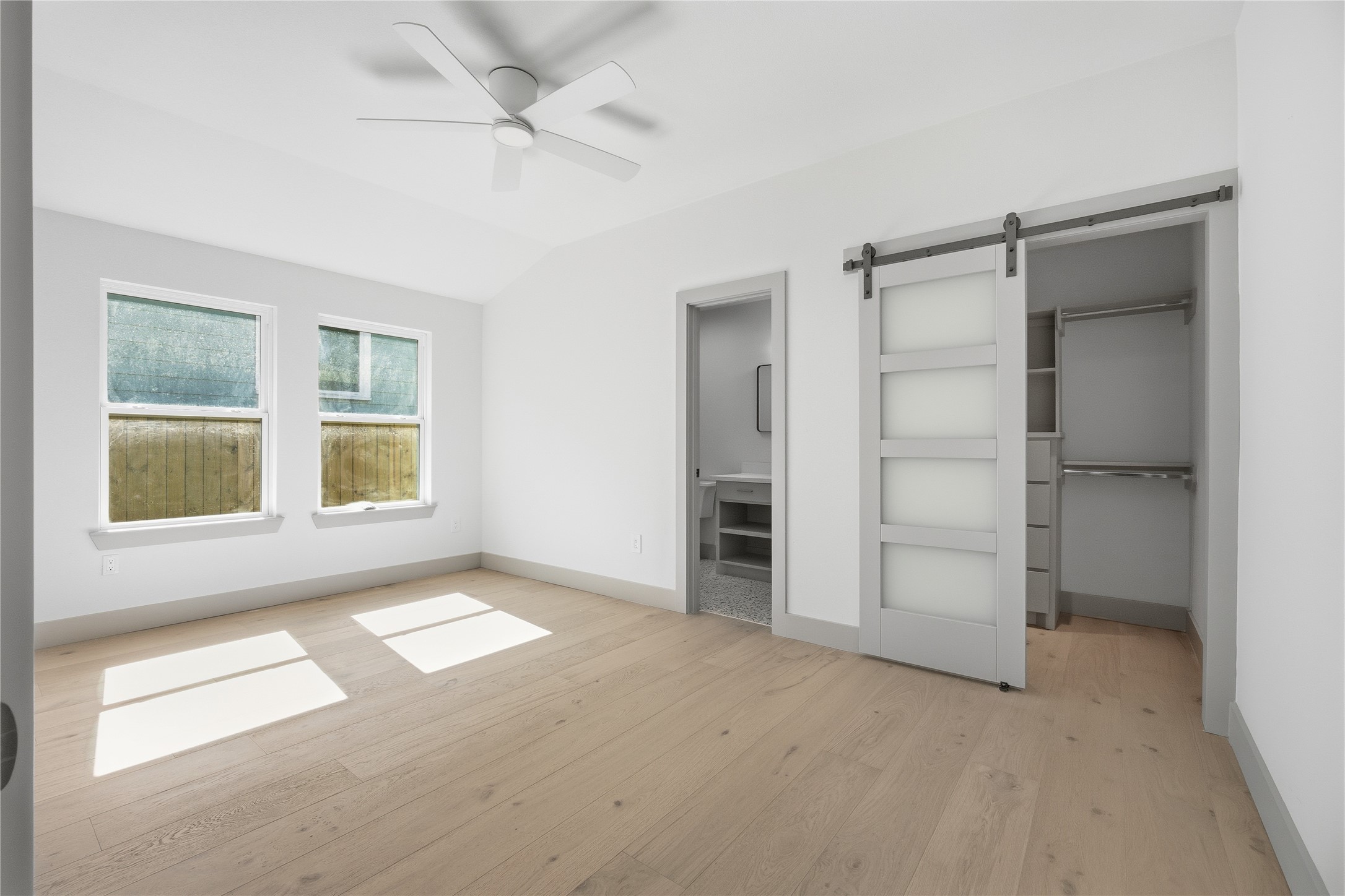 1415 Tabor Street Houston, TX 77009 - Photo 15 of 31 an empty room with windows and closet