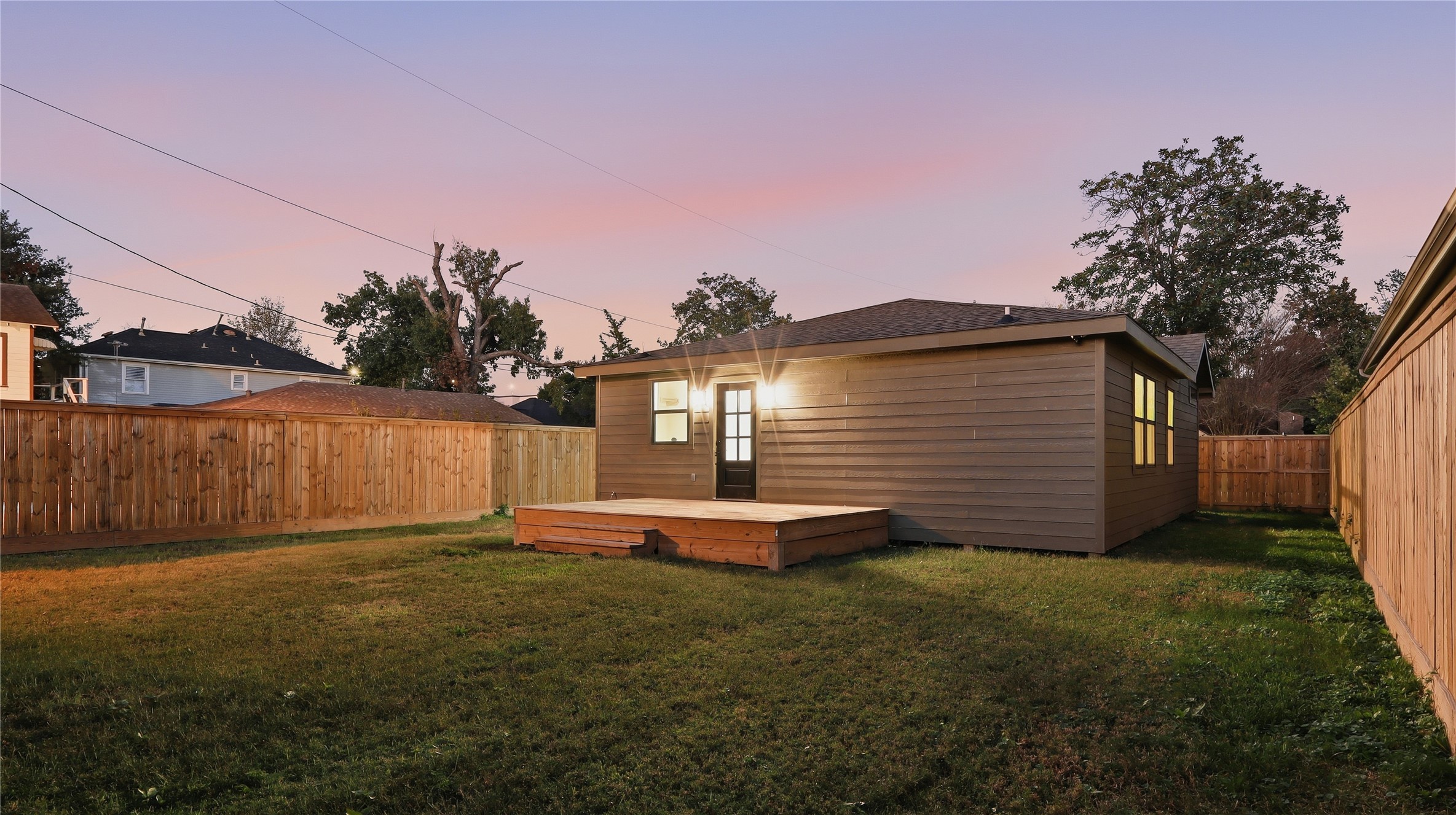 1415 Tabor Street Houston, TX 77009 - Photo 22 of 31 a front view of a house with a yard