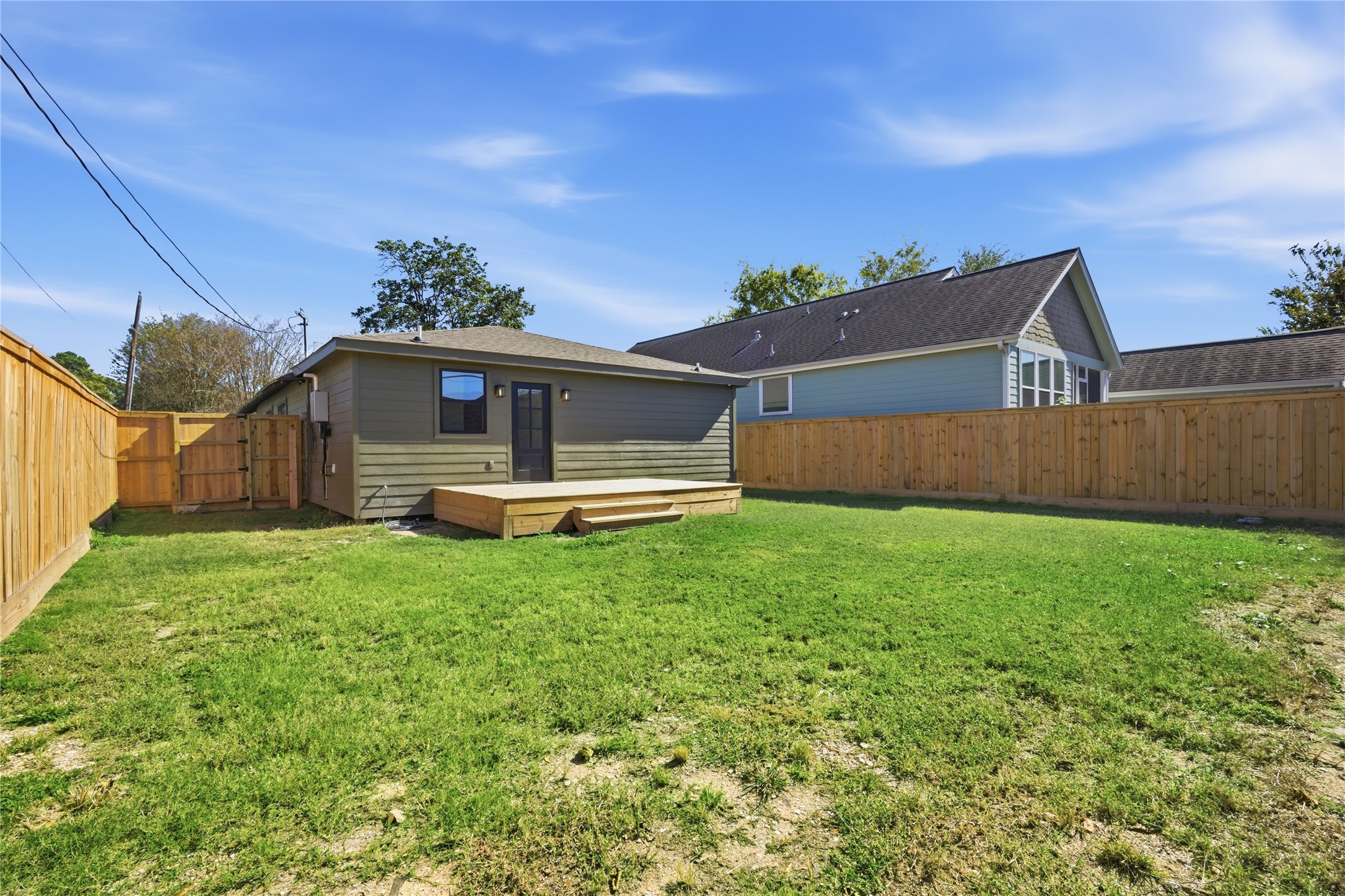 1415 Tabor Street Houston, TX 77009 - Photo 23 of 31 a front view of a house with a yard and garage