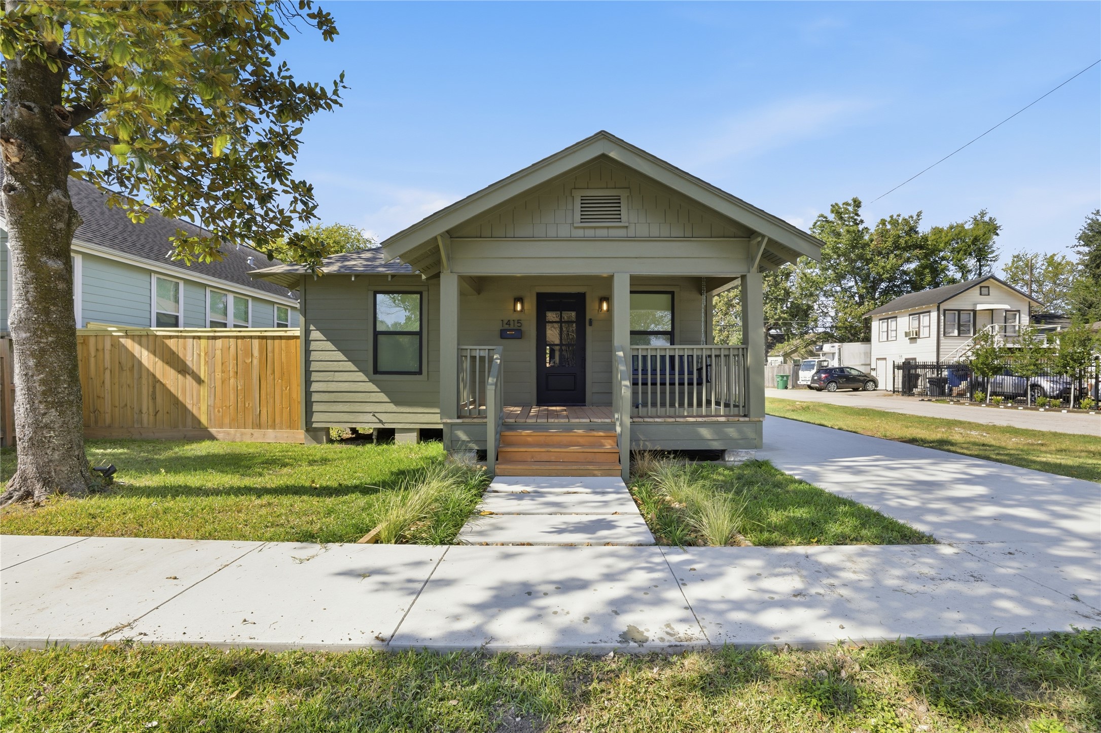 1415 Tabor Street Houston, TX 77009 - Photo 3 of 31 a front view of a house with garden