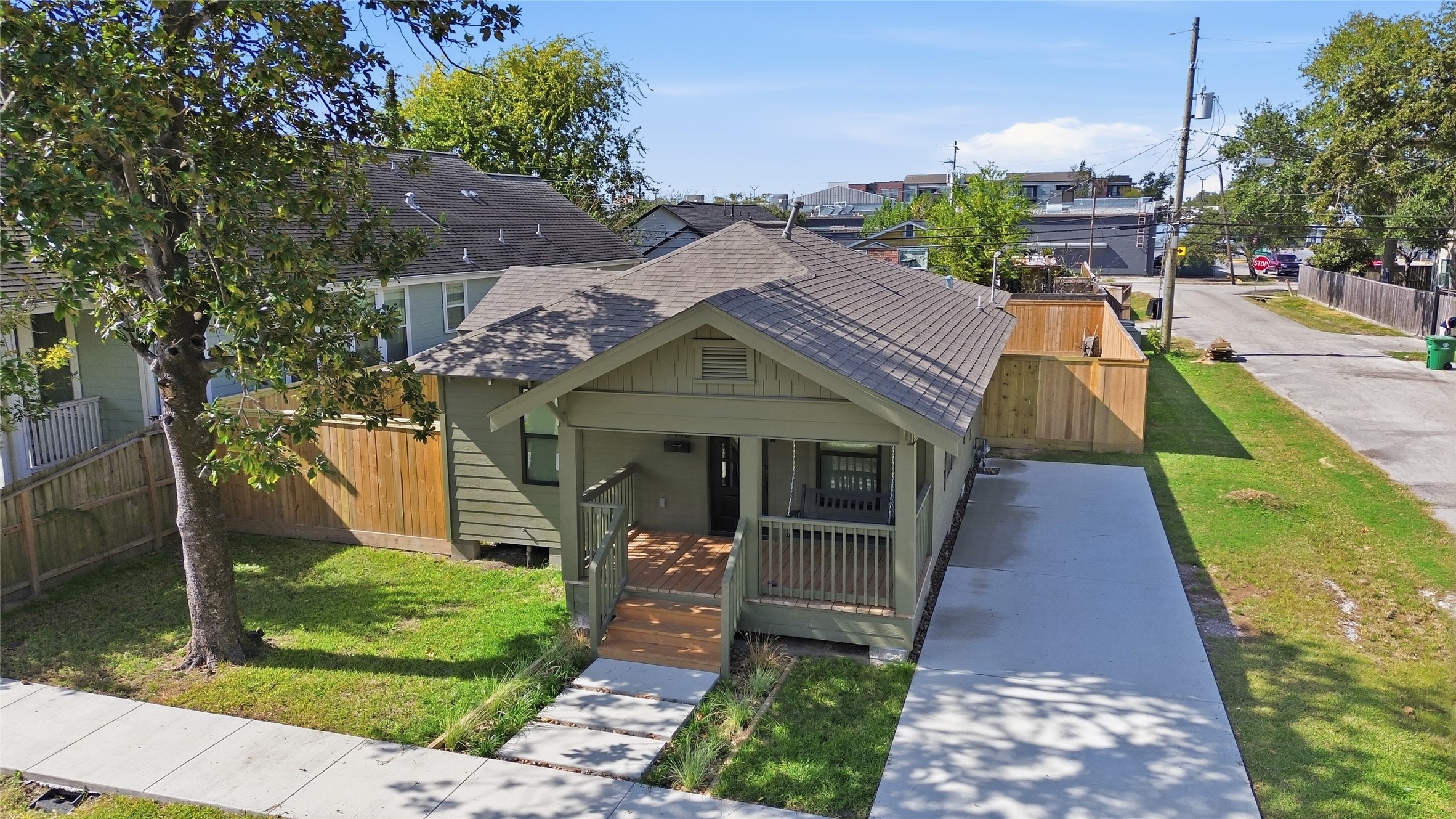 1415 Tabor Street Houston, TX 77009 - Photo 4 of 31 a front view of a house with a yard