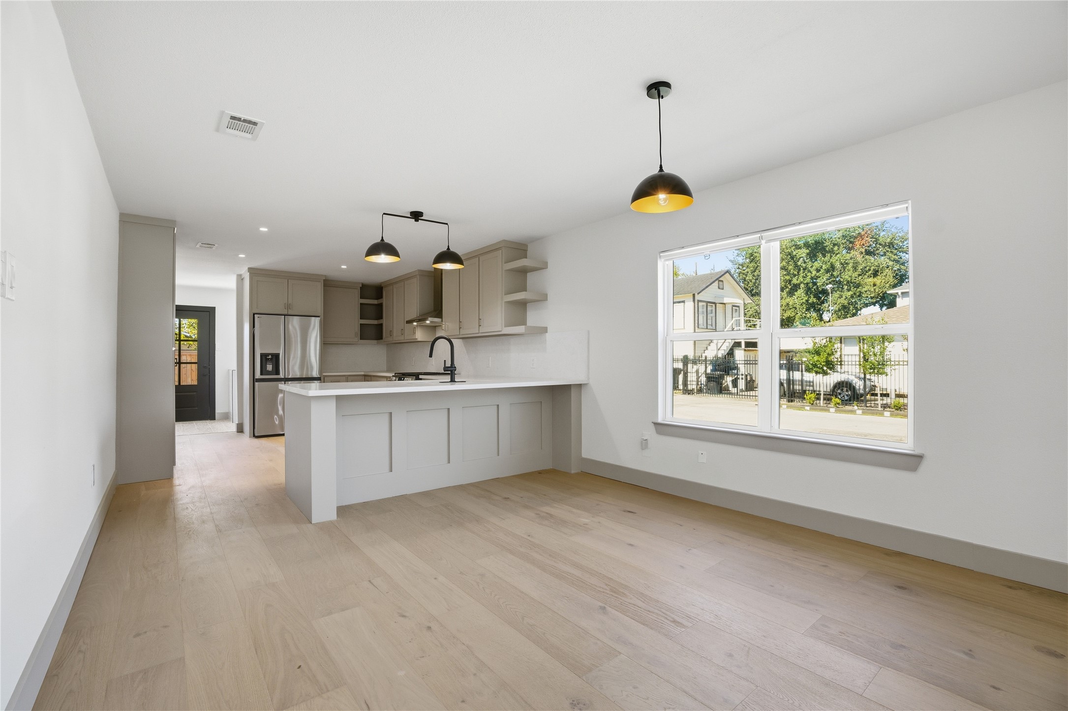 1415 Tabor Street Houston, TX 77009 - Photo 6 of 31 a very nice looking room with a large window