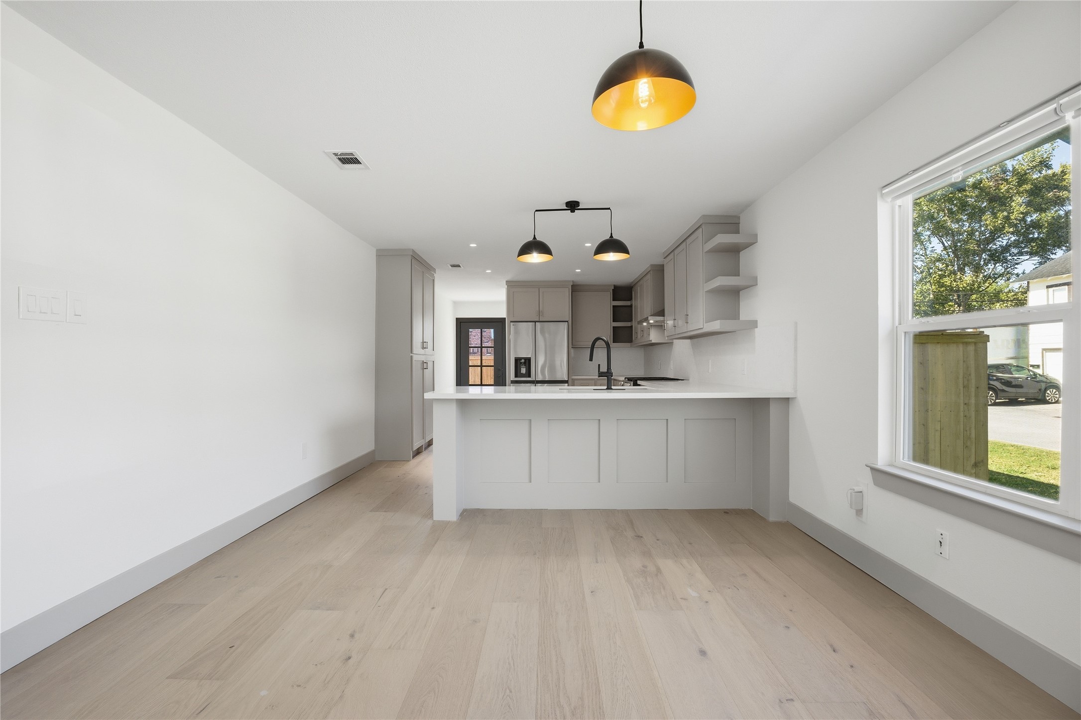 1415 Tabor Street Houston, TX 77009 - Photo 7 of 31 a view of kitchen with furniture and window